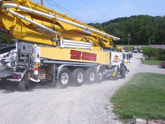 Autocar ACX Heavy  Truck Totes a Big Concrete Pump